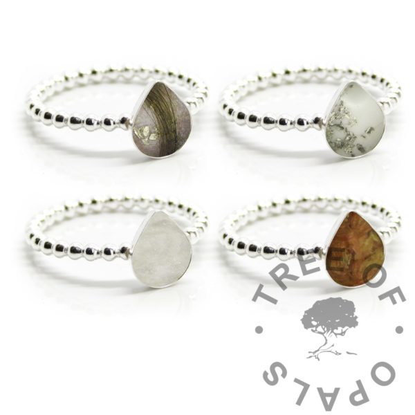 breastmilk teardrop ring teardrop bubble band rings. Solid silver handmade rings with teardrop shaped bezel cups for direct pour. Breastmilk,umbilical cord and lock of hair inclusions with resin sparkle mix. 2mm pearl wire with 8x6mm pear shape cup, baby andbreastfeeding keepsake mementos, image mockups