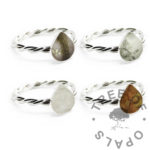 teardrop twisted band rings. Solid silver handmade rings with teardrop shaped bezel cups for direct pour. Breastmilk,umbilical cord and lock of hair inclusions with resin sparkle mix. 2.4mm twist wire with 8x6mm pear shape cup, baby andbreastfeeding keepsake mementos, image mockups