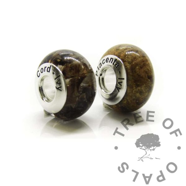 placenta and cord beads engraved in arial font. Clear resin and goddess golden sparkle mix charm beads for large hole bead European style bracelets. Solid sterling silver 925 bead core, resin and baby's umbilical cord. Baby keepsake jewelry