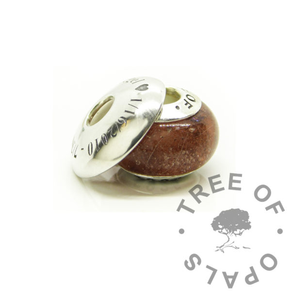 engraved washer fur ashes bead, bead washer and bead. Cremation ashes and fur bead for European bracelets with Times New Roman engraved domed bead washer. Solid 925 sterling silver bead core stamped Tree of Opals, custom bead core design. Lock of hair or fur keepsake and memorial jewellery with dragon's blood red resin sparkle mix and naturally white fur strands