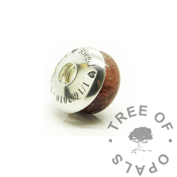 engraved washer fur ashes bead, bead washer and bead. Cremation ashes and fur bead for European bracelets with Times New Roman engraved domed bead washer. Solid 925 sterling silver bead core stamped Tree of Opals, custom bead core design. Lock of hair or fur keepsake and memorial jewellery with dragon's blood red resin sparkle mix and naturally white fur strands
