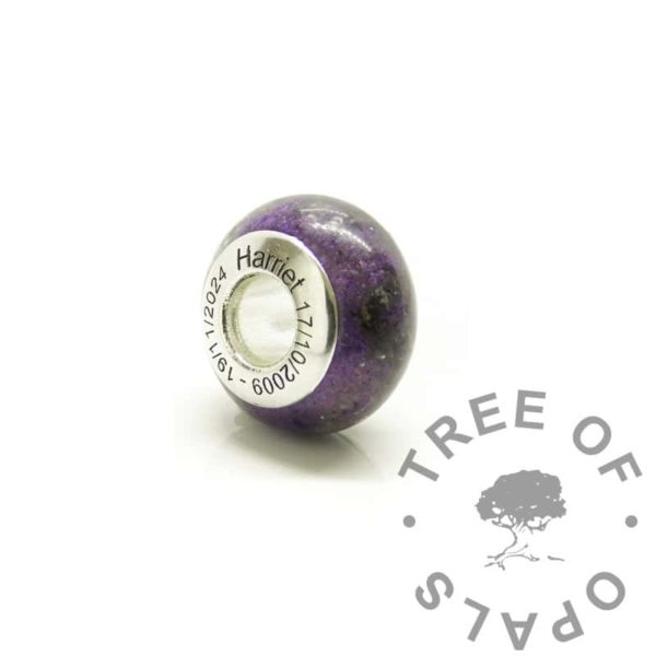 Cremation Ashes Bead engraved memorial bead. Cremation ashes and purple sparkle. Engraved bead core with dates of birth and passing, arial font. Memorial jewellery in the UK. Solid sterling silver 925 stamped