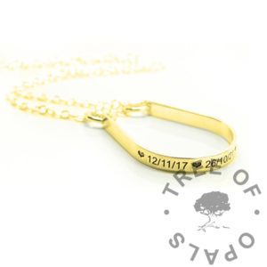 Gold Ring Holder Necklace gold engraved ring holder necklace. Arial font engraving dates with heart emojis. 1.7mm chain with jump rings soldered together. 3mm wide ring holder necklace for storing rings, perfect for healthcare workers and anyone who can't wear a ring at all times.Solid 9ct yellow gold hallmarked image mockup